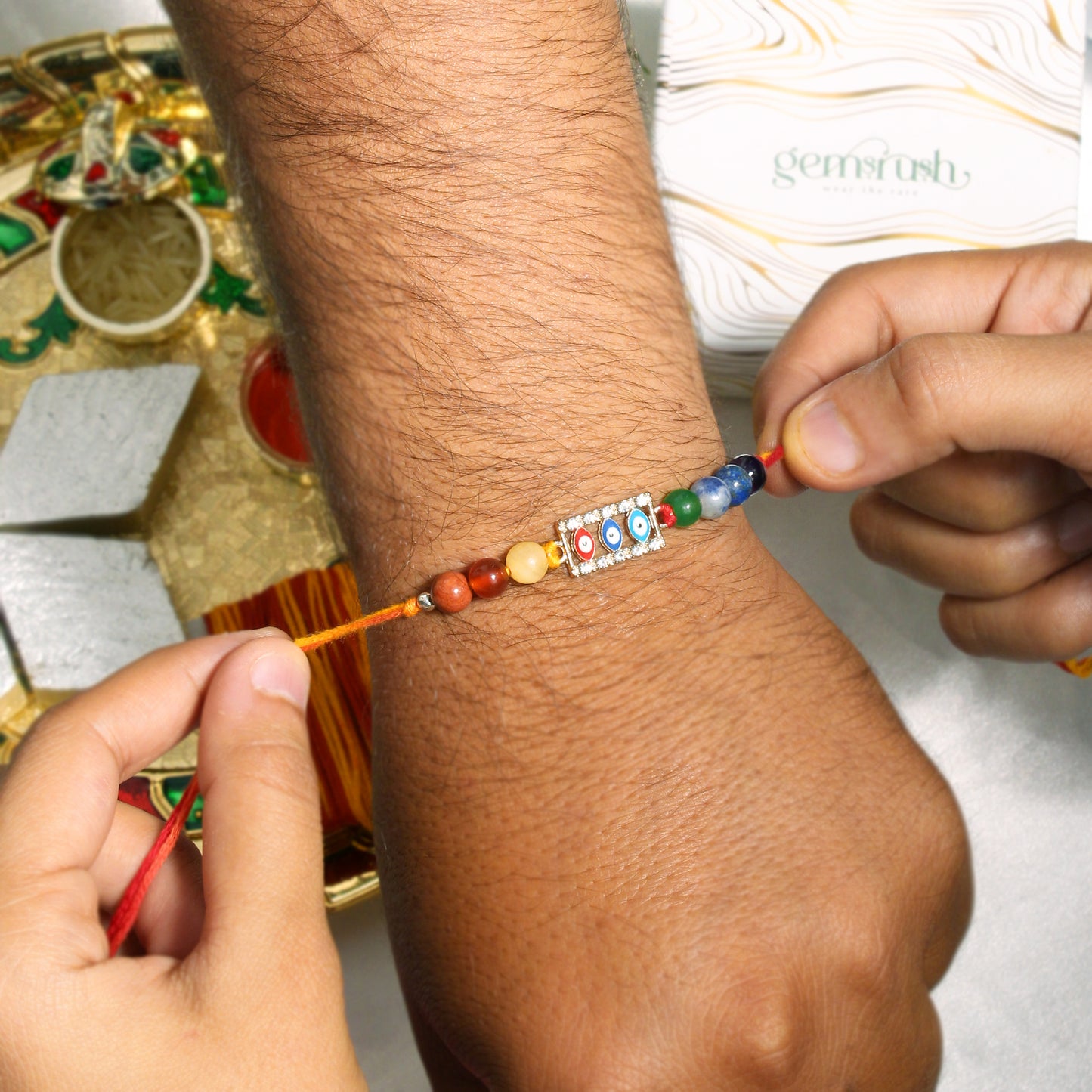 Triple Evil Eye Charm Gemstone Rakhi – Protection Rakhi with Natural Healing Stones