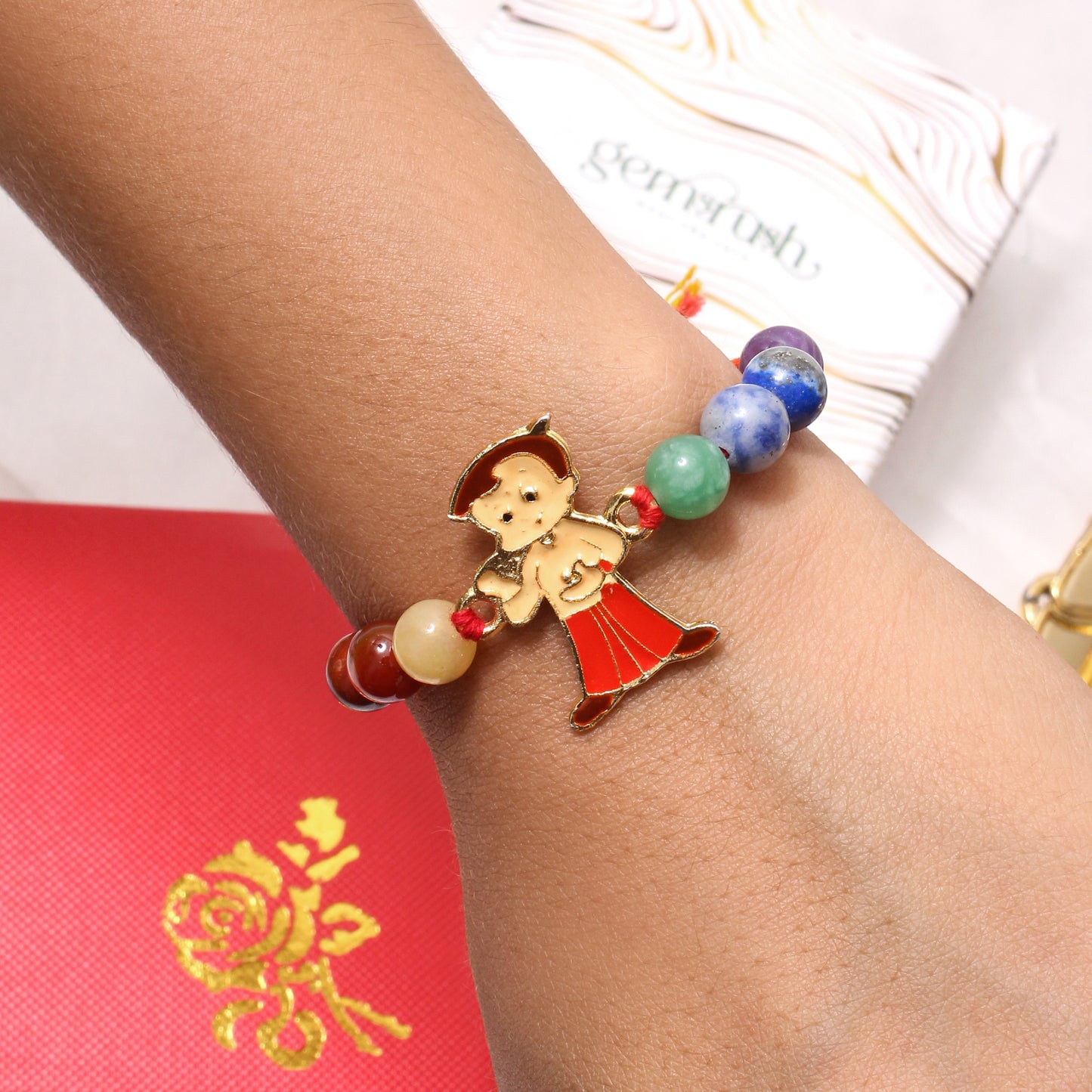 Kids Gemstone Rakhi with Chhota Bheem Charm – Vibrant & Playful Healing Rakhi