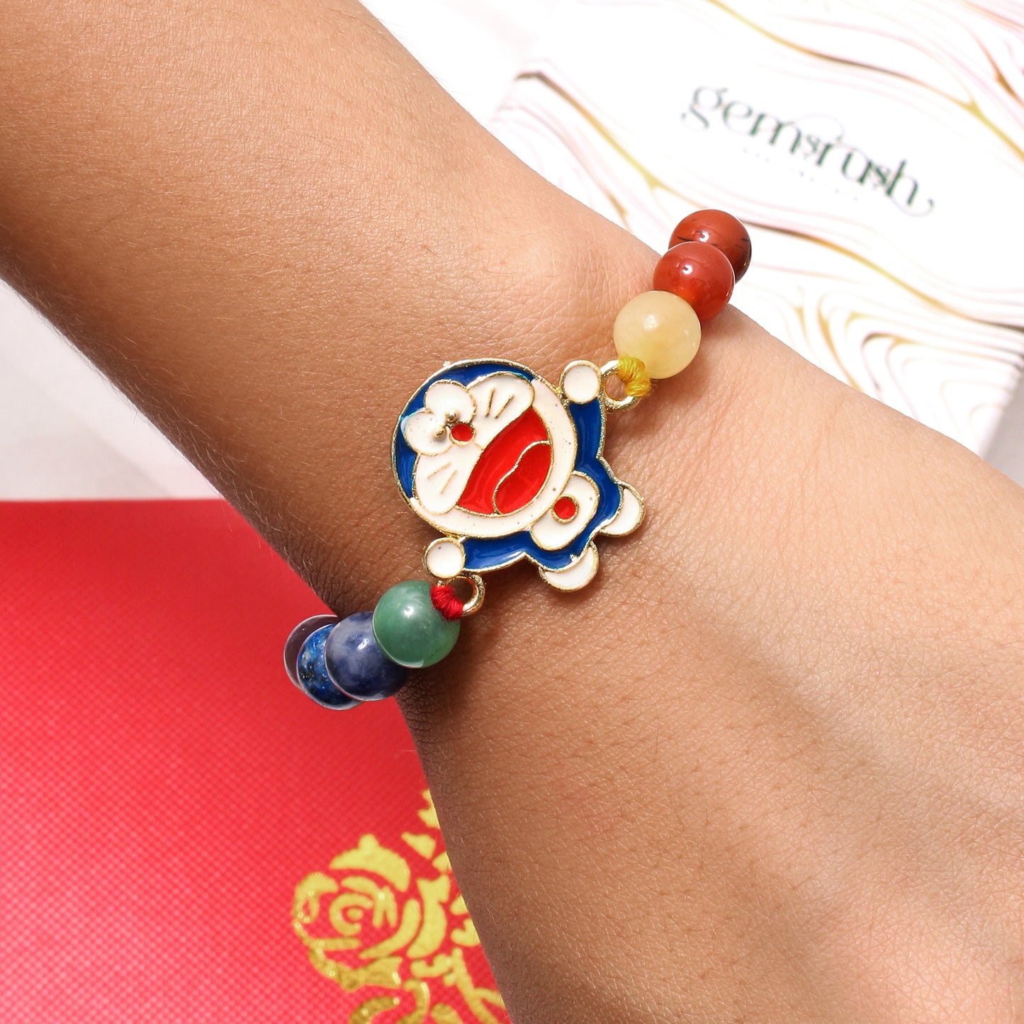 Doraemon Charm Gemstone Rakhi for Kids – With Natural Healing Beads & Playful Charm
