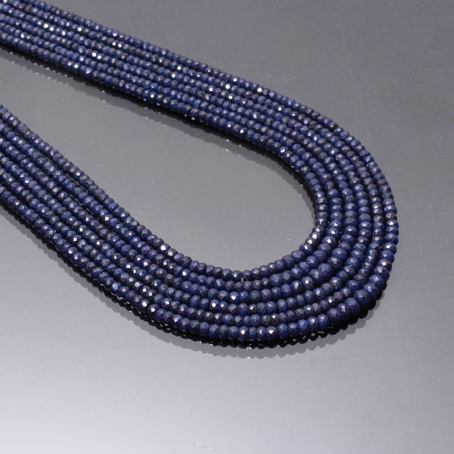 Blue Sapphire Six-Layer Beaded Necklace – Luxurious Multi-Strand Statement Jewelry
