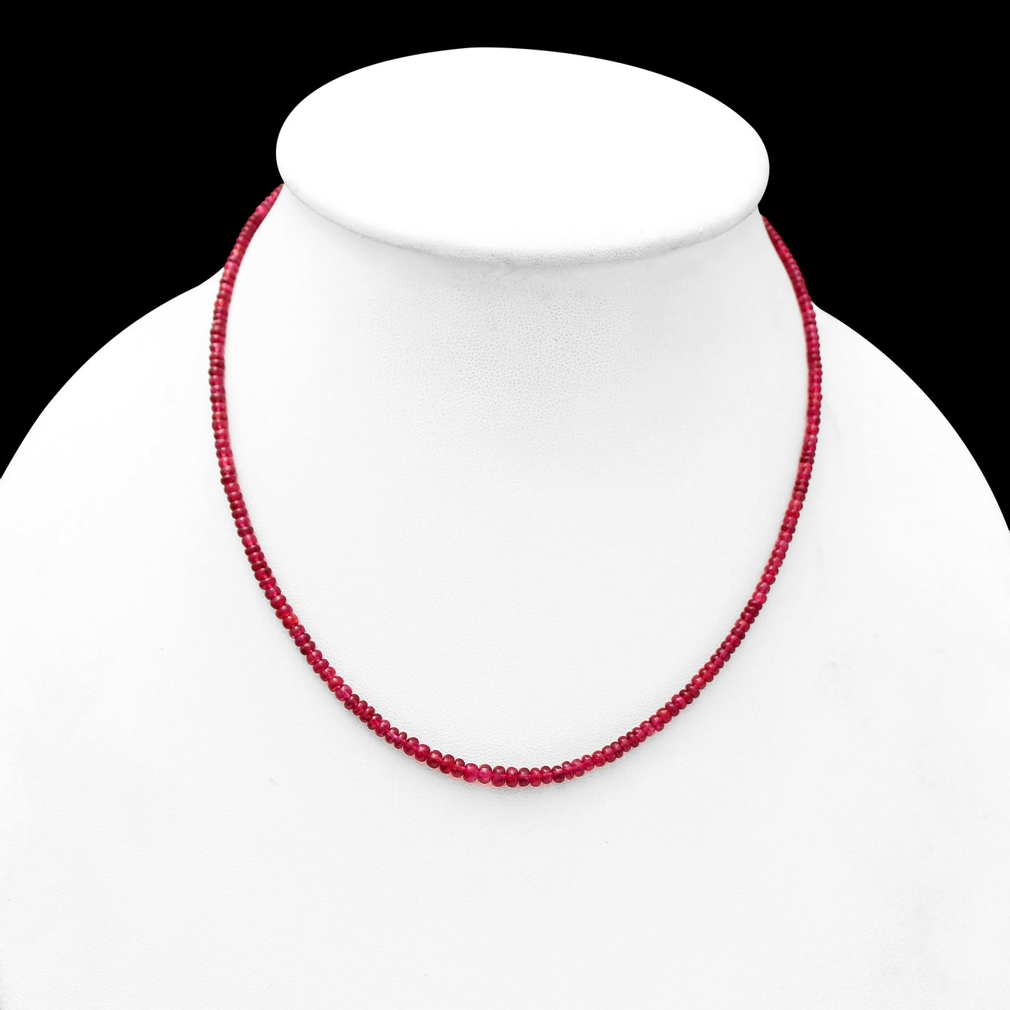 red spinel necklace, on white dummy ,black background