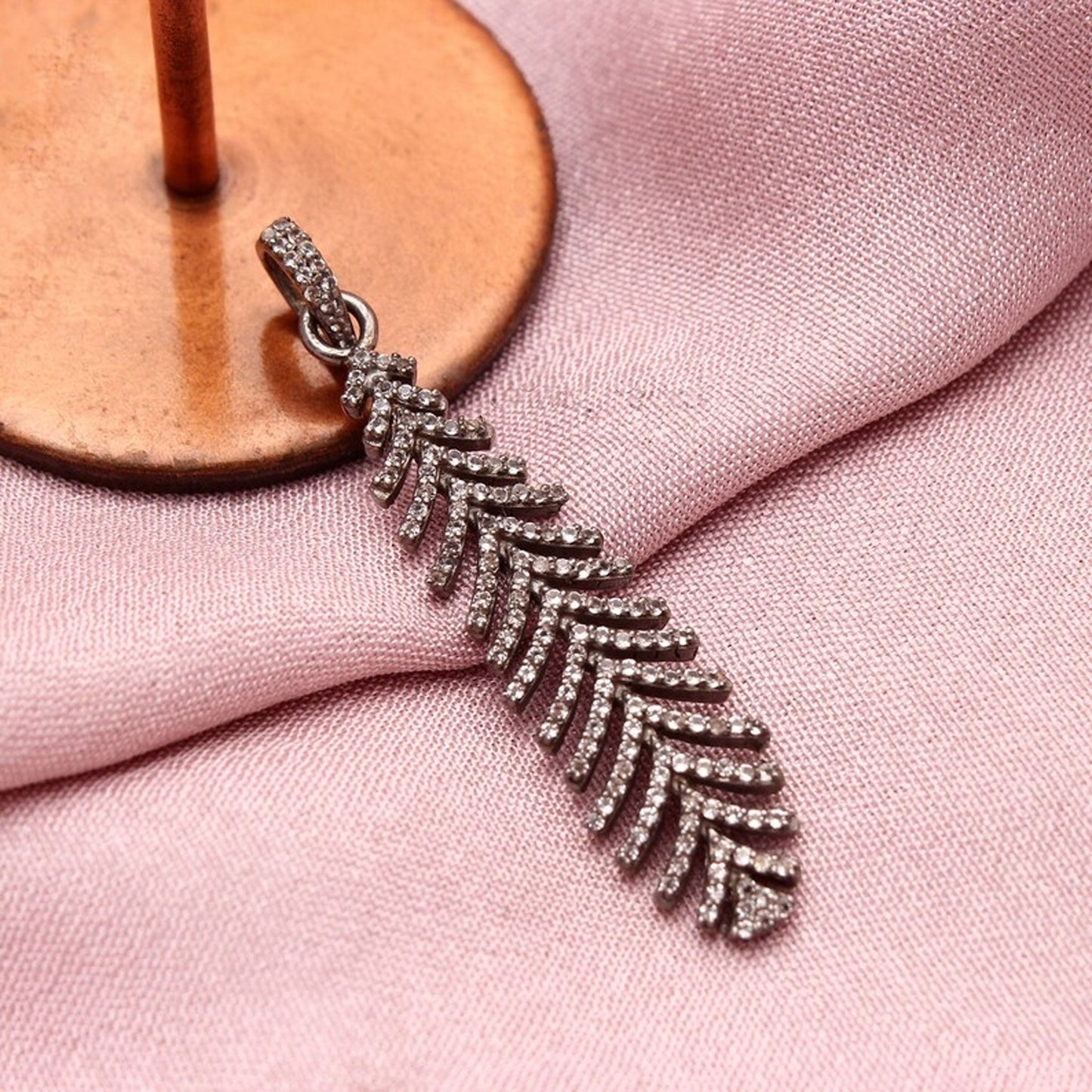 Sterling Silver Feather Pendant studded with CZ GemsRush