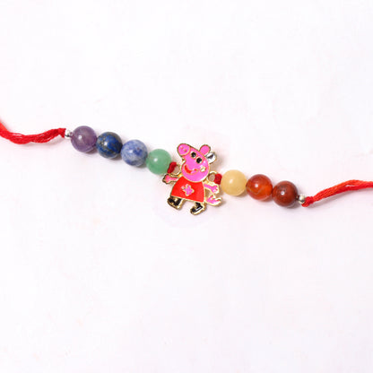 Colorful Natural Gemstone Rakhi with Peppa Pig Cartoon Charm – Fun & Healing Rakhi for Kids