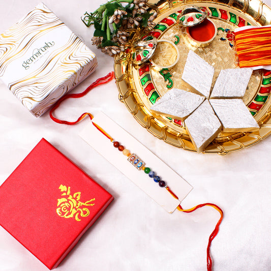 Triple Evil Eye Charm Gemstone Rakhi – Protection Rakhi with Natural Healing Stones