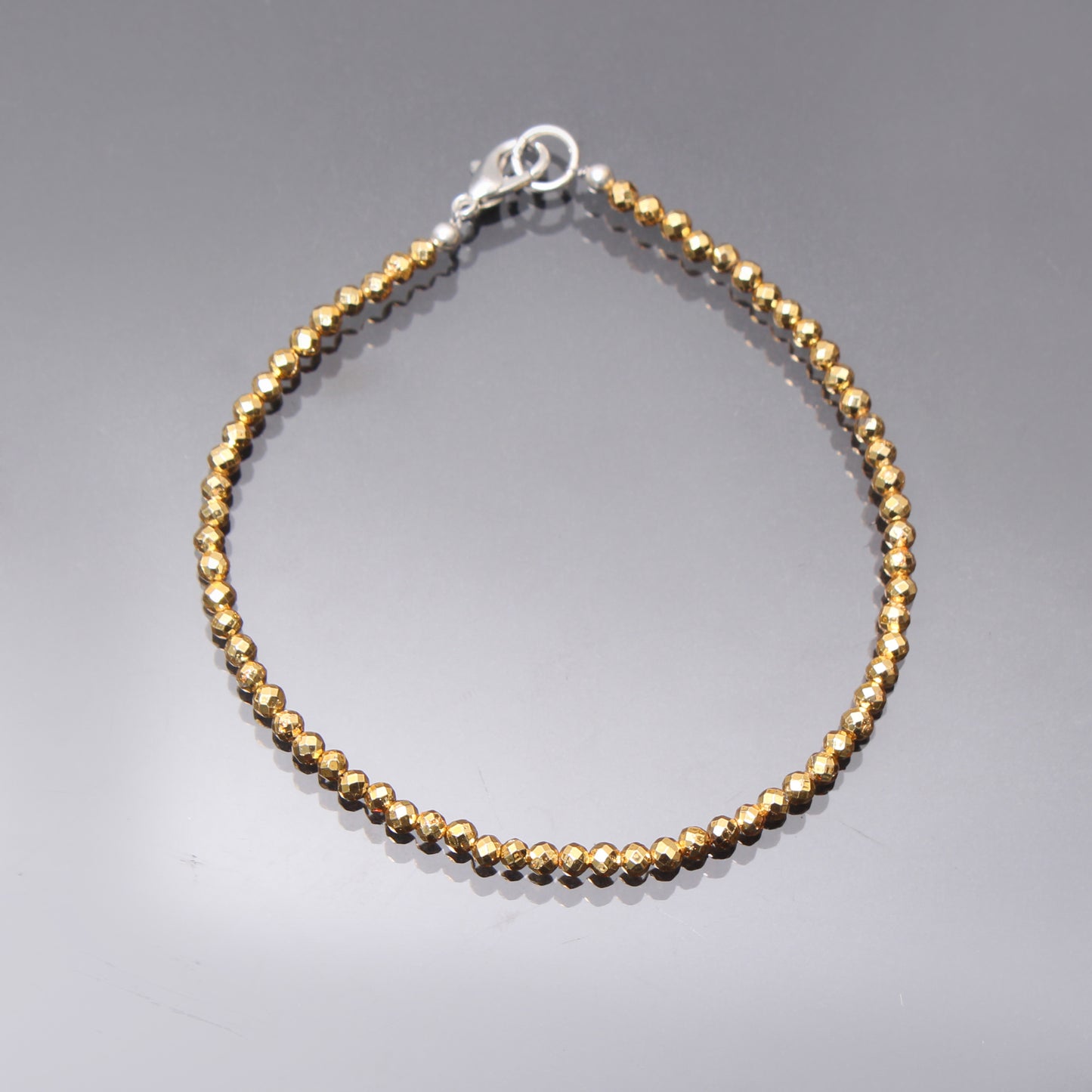 Harness Balance & Vitality with a Golden Hematite Beaded Bracelet - Enhance Energy & Protection