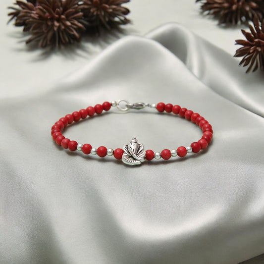 Coral Beaded Bracelet With Ganesha Charm