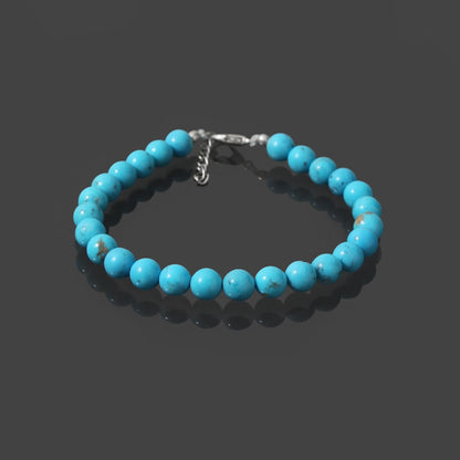 Tranquil Splendor: Turquoise Smooth Round 7mm Bracelet with Lobster Lock