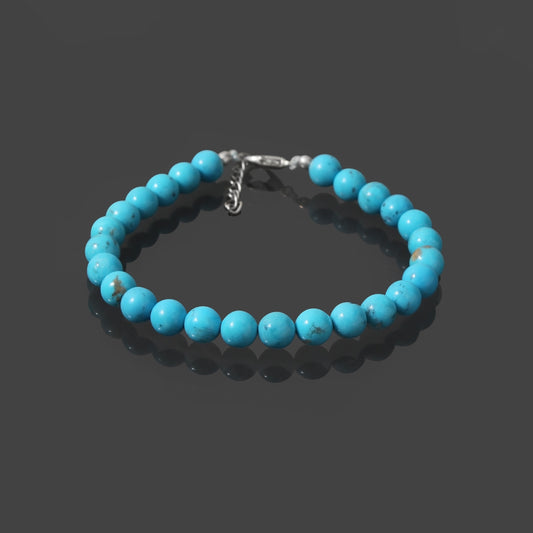 Tranquil Splendor: Turquoise Smooth Round 7mm Bracelet with Lobster Lock