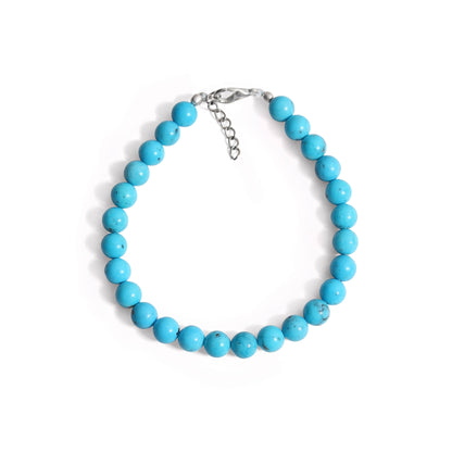 Tranquil Splendor: Turquoise Smooth Round 7mm Bracelet with Lobster Lock