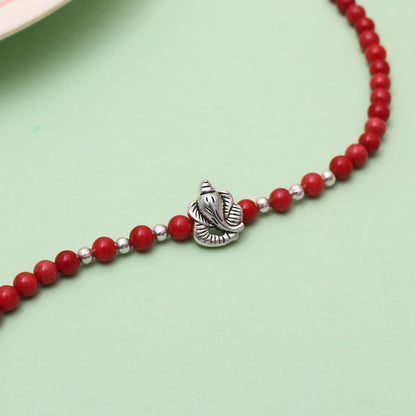 Coral Beaded Bracelet With Ganesha Charm