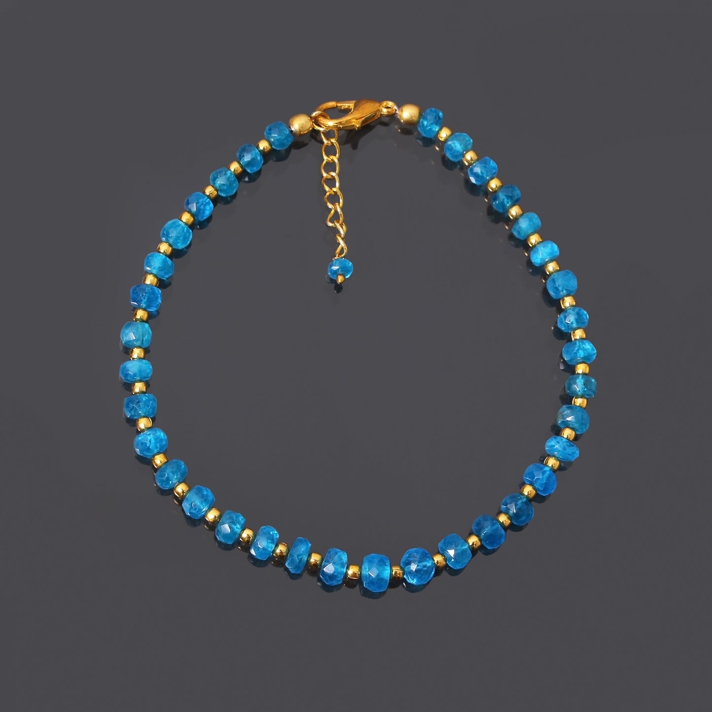 Neon Blue Apatite Gemstone Faceted Rondelle Bracelet with Gold Plated Silver Clasp