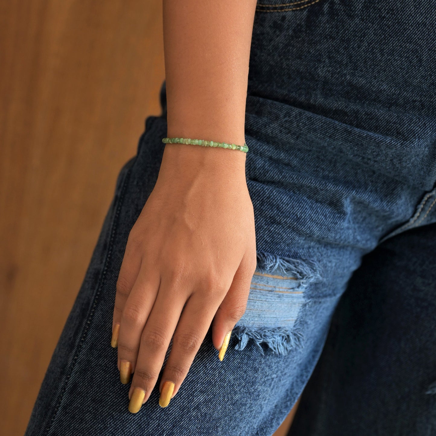 Emerald rondelle bracelet with 925 sterling silver lobster clasp and 3-3.5mm stones.