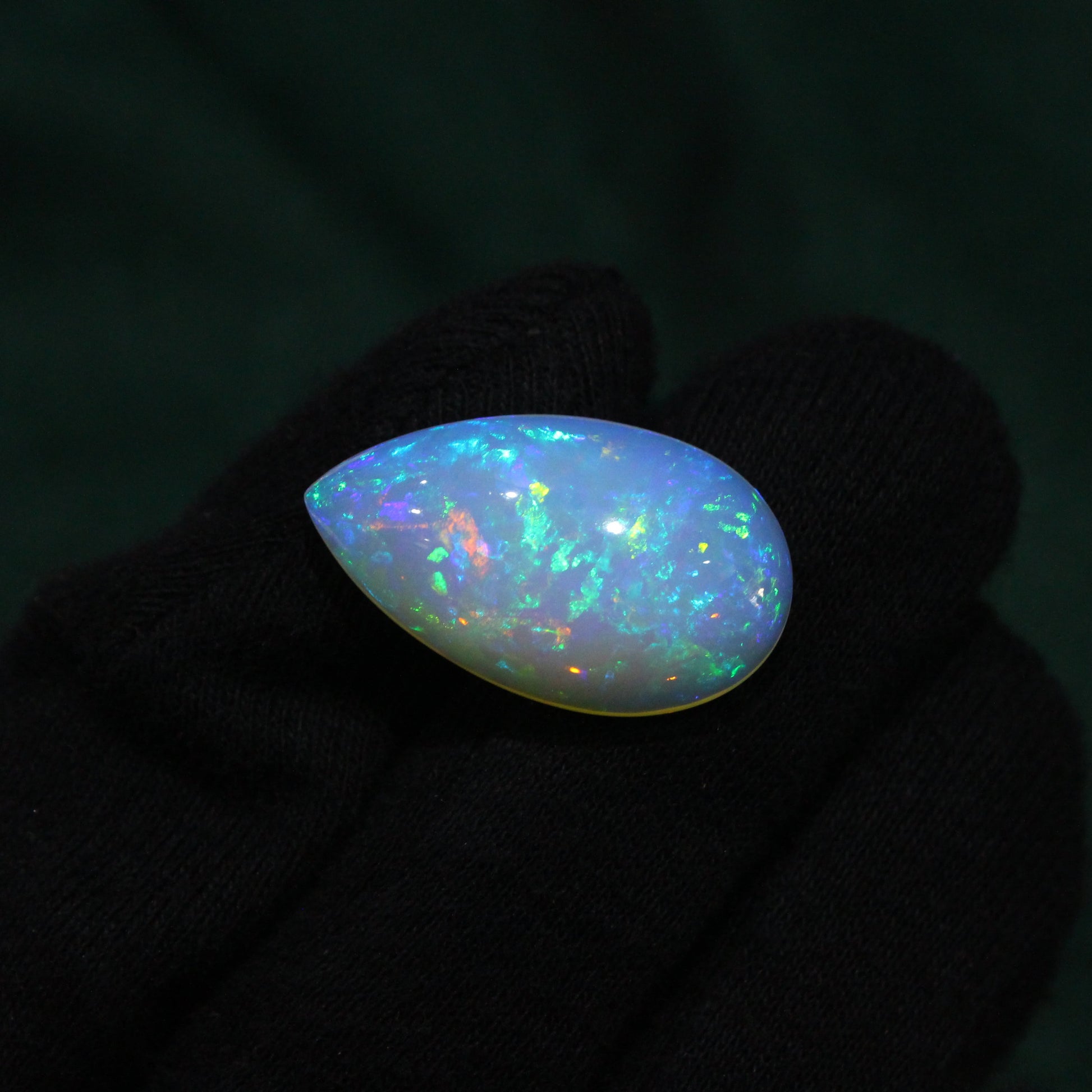 Ethiopian Fire Opal Pear Shape Cabochon GemsRush