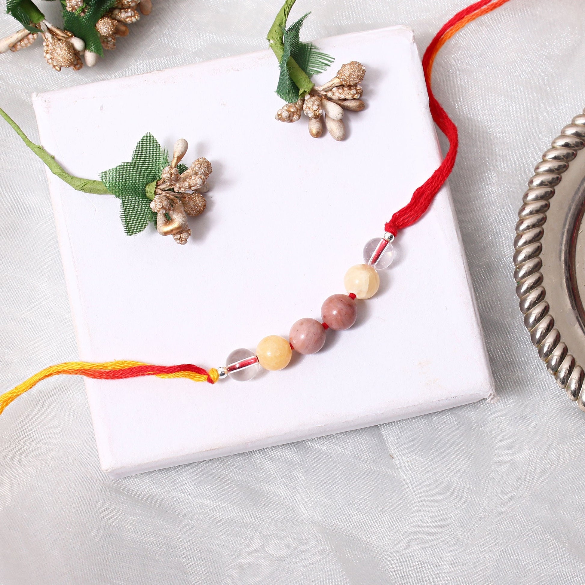 Handcrafted Gemstone Rakhi this Raksha Bandhan give Perfect Gift to Bhai GemsRush