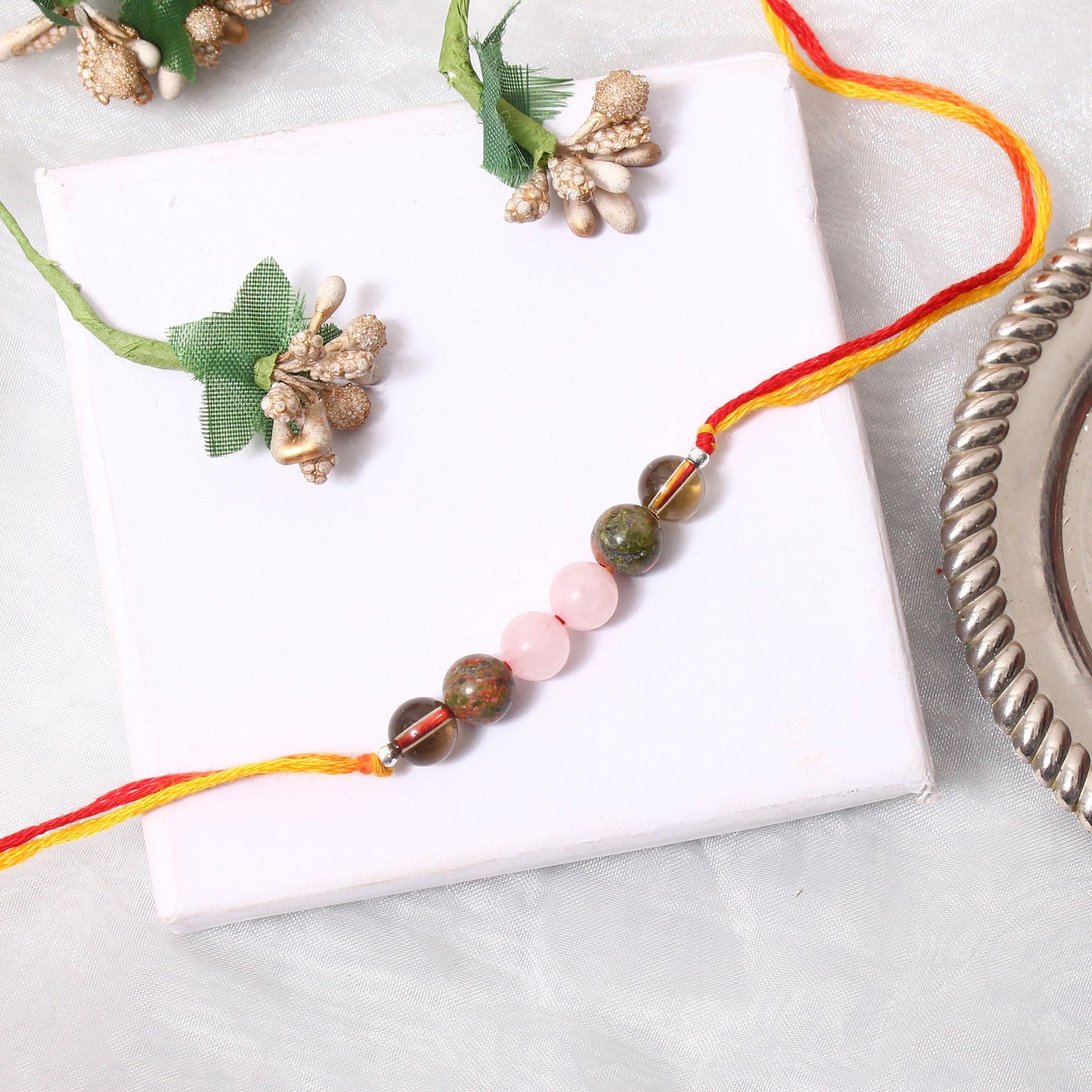 Natural Gemstones Rakhi | Give a unique Gift to Brother GemsRush