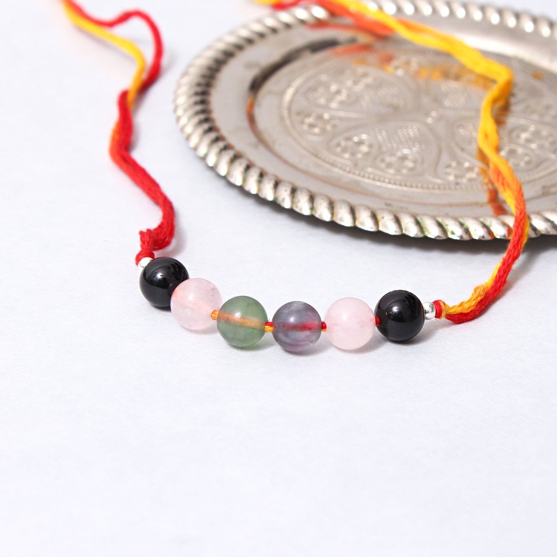 Special Gemstone Rakhi for Brother: Handcrafted with Natural Round Gemstones GemsRush