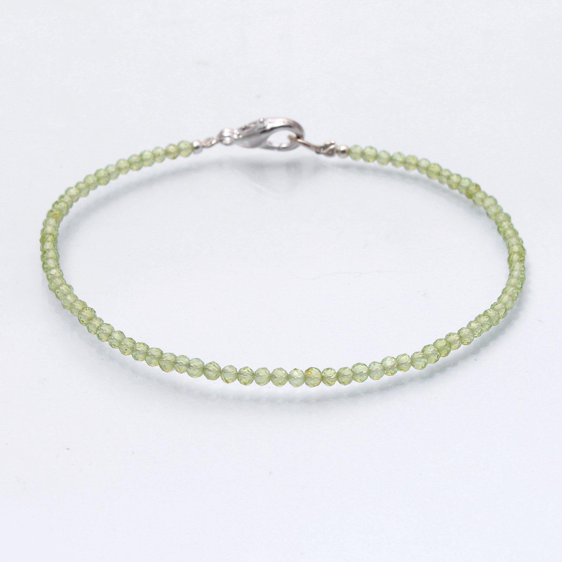 Sterling Silver Wire-Adorned Natural Peridot Minimalist Bracelet with Lobster Lock GemsRush